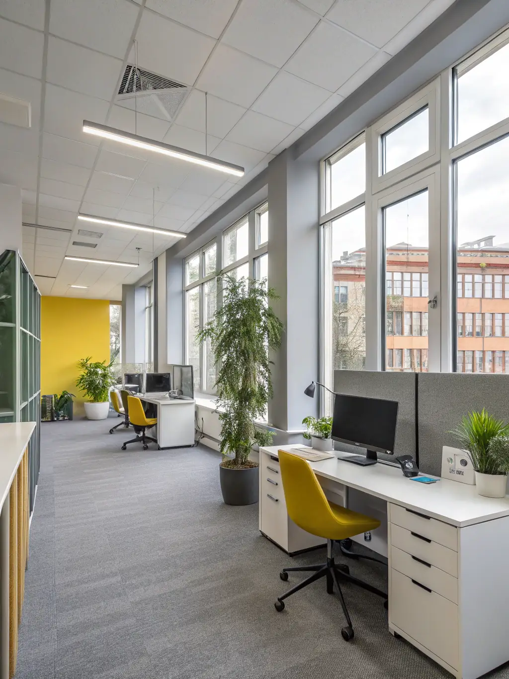 A modern, clean office space with organized desks and happy employees, reflecting a productive and well-maintained work environment, ideal for Boholte Cleaning's commercial services.